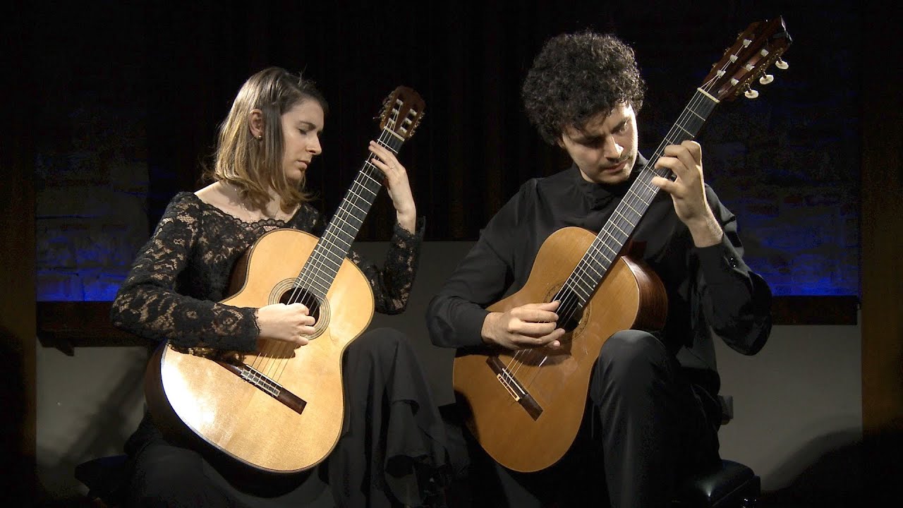 https://www.tp24.it/immagini_eventi/1628344502-tuscan-guitar-duo.jpg
